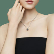 Chatelaine Onyx Crossover Pendant